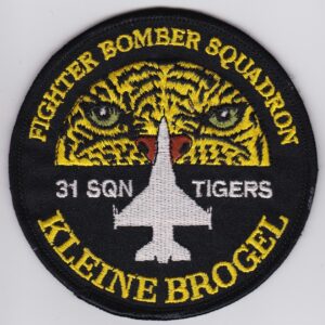 A patch with the words fighter bomber squadron tigers.