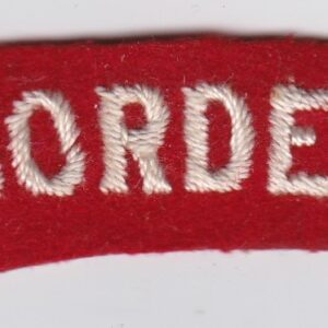 A red and white badge with the word border on it.