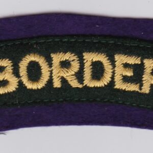 A purple and gold border badge on a white surface.