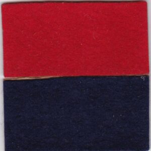 A red and black felt square on a white surface.