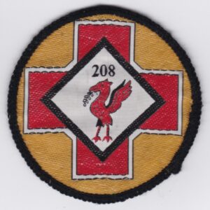 A red and white patch with a cross on it.