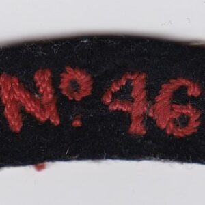 A black and red badge with the word no 46 on it.