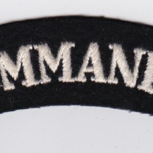 A badge with the word commando on it.