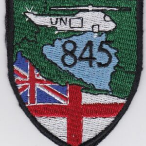 A patch with a british flag and a helicopter on it.