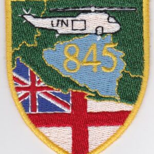 A patch with a british flag and a helicopter on it.