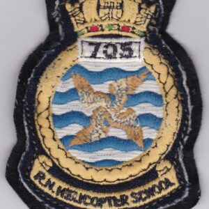 A badge with the emblem of a helicopter squadron.