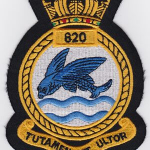 A badge with a bird and a fish on it.