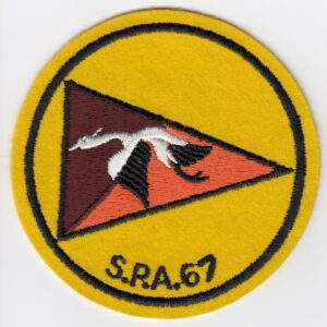 A yellow patch with the words sra 67 on it.