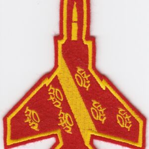 A red and yellow fighter jet embroidered on a white surface.