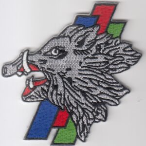 A badge with a wolf's head on it.