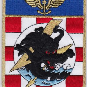 A patch with a dragon and an eagle on it.