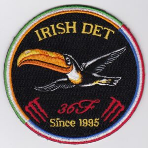 An irish det patch with a toucan on it.