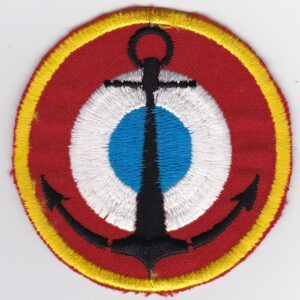 A red, white and blue patch with an anchor on it.