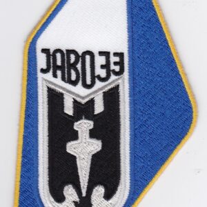 A blue and white patch with the word eodal on it.