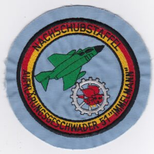 A patch with a red and green design on it.