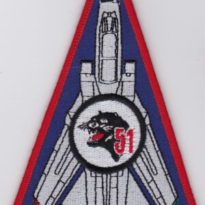 A triangle shaped patch with an image of a fighter jet.