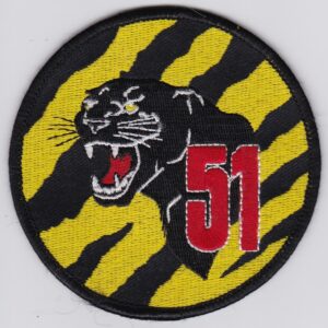 A patch with the number 51 on it.