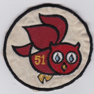 A patch with an owl on it.