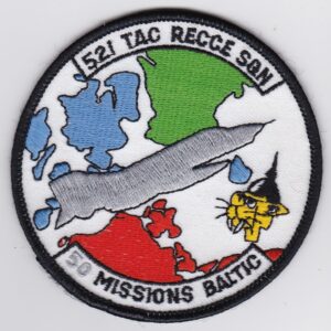 A patch with an image of a plane and a map.