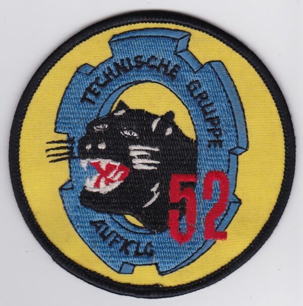 A patch with an image of a panther on it.