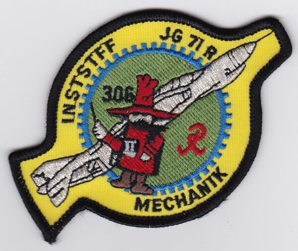 A patch with a picture of a rocket.