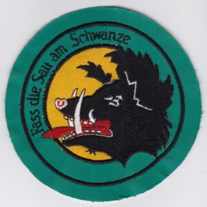 A green patch with an image of a boar.