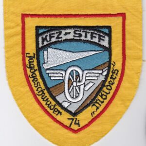 A yellow patch with the words kfz stf on it.