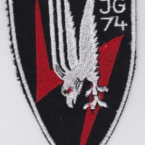 A black and white patch with an eagle on it.