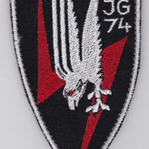 A black and white patch with an eagle on it.