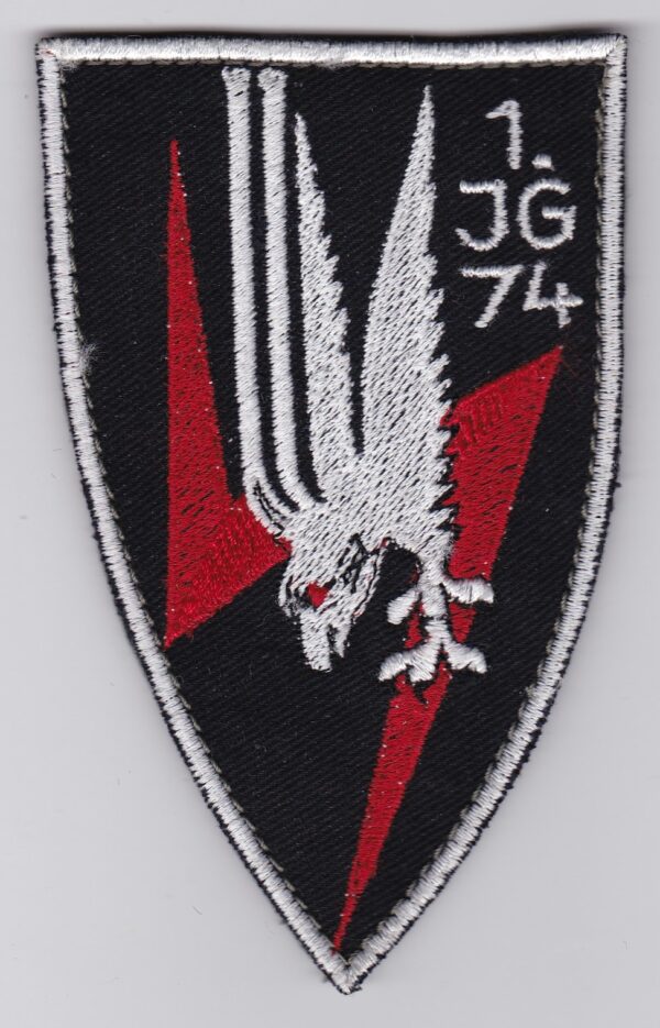 A black and white patch with an eagle on it.