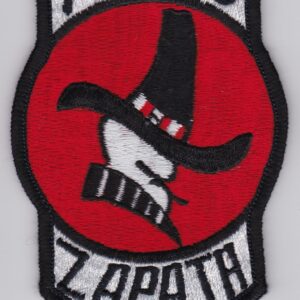 A red and black patch with a face and hat.