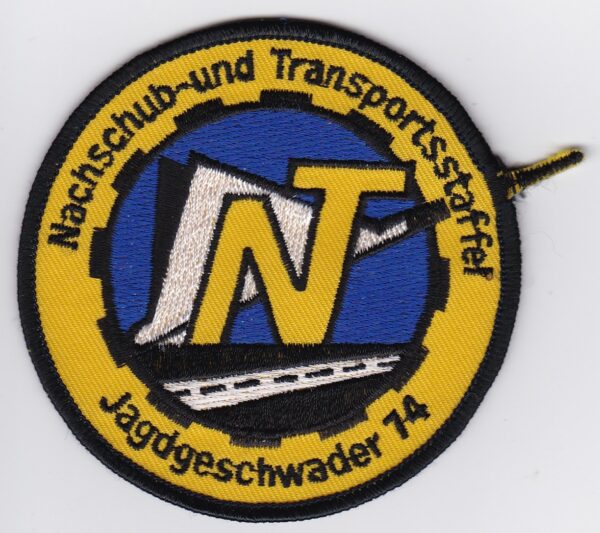 A patch with the logo of a club and a truck.