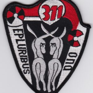 A black and white patch with a red and white design.