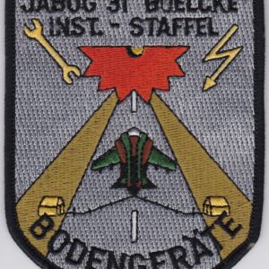 A patch with a logo on it.