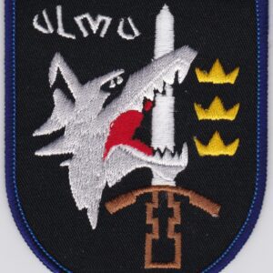 A patch with a wolf and a crown on it.