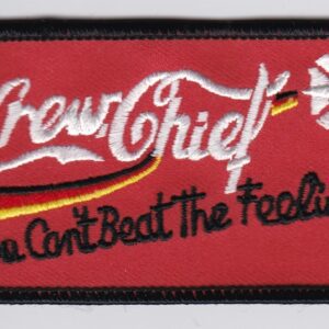 A patch with the words'you can't beat the feeling'on it.