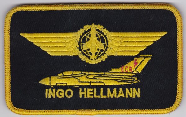 A patch with the words ingo hellmann on it.