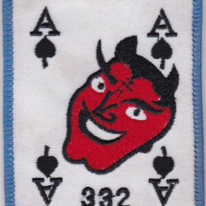 A patch with a devil face on it.