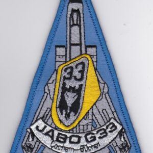 A patch with a triangle on it.