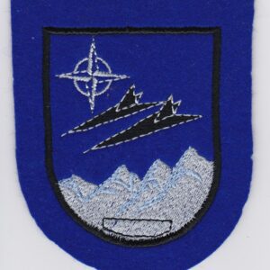 A blue patch with two planes on it.