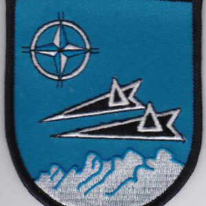 A blue patch with two planes and a compass on it.