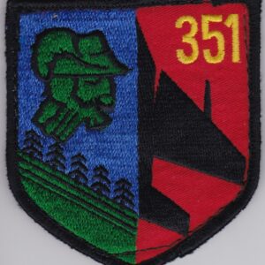 A patch with the number 351 on it.