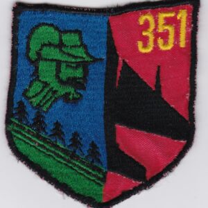 A patch with the number 351 on it.