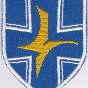 A blue and yellow patch with a bird on it.