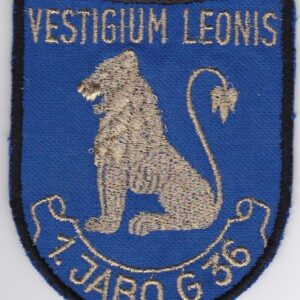 A blue patch with a lion on it.