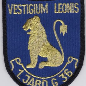 A blue patch with a lion on it.