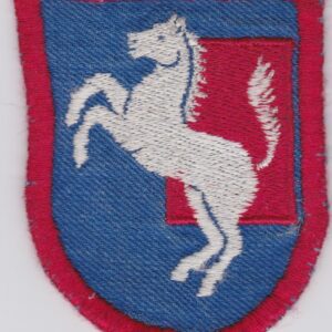 A blue and white patch with a horse on it.