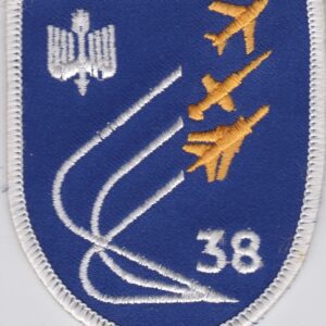 A blue and white patch with the number 38 on it.