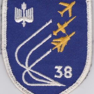 A blue and white patch with an image of a plane flying in the sky.