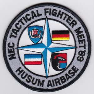 A patch with the words tactical fighter meet 89 on it.